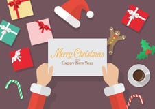 Santa Claus hands holding a Merry Christmas and Happy new year s vector illustration Santa Claus hands holding a Merry Christmas and Happy new year s vector illustration