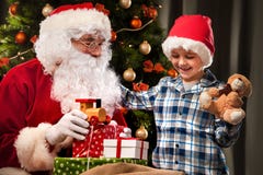 Santa Claus and a little boy royalty free stock images Santa Claus and a little boy royalty free stock images