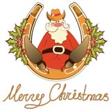 Santa In Cowboy Shoes Sit On Lucky Horseshoe. Royalty Free Stock Photography