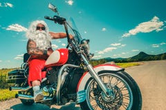 Santa on a motorcycle royalty free stock images Santa on a motorcycle royalty free stock images