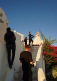 Santorini Grekland, September 21, 2018 och att gifta sig fotoskytte på härliga lägen royaltyfri bild Santorini Grekland, September 21, 2018 och att gifta sig fotoskytte på härliga lägen royaltyfri bild