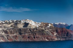 Santorini, Греция, взгляд от шлюпки круиза Стоковые Изображения Santorini, Греция, взгляд от шлюпки круиза Стоковые Изображения