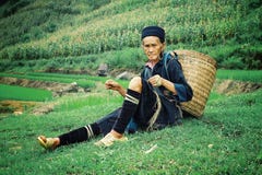 elderly black hmong tribe member woman resting home after a long day work at his farm spinning threads stock image elderly black hmong tribe member woman resting home after a long day work at his farm spinning threads stock image
