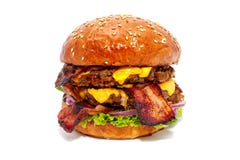 Sappige rundvleeshamburger met bacon, kaas en salade stock afbeelding Sappige rundvleeshamburger met bacon, kaas en salade stock afbeelding