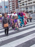 Sasebo, Japan - 07JAN2018: Japanese women crossing the street during coming of age day in japan. stock photos Sasebo, Japan - 07JAN2018: Japanese women crossing the street during coming of age day in japan. stock photos
