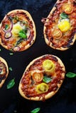 Savory mini Italian pizzas stock image Savory mini Italian pizzas stock image