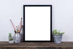 Scandinavian Style Empty Photo Frame Mock Up. Minimal Home Decor Royalty Free Stock Image Scandinavian Style Empty Photo Frame Mock Up. Minimal Home Decor Royalty Free Stock Image