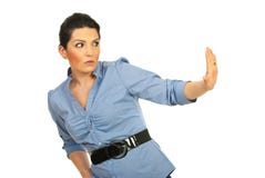 Scared woman with stop hand to a side stock photo Scared woman with stop hand to a side stock photo