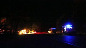 Scene of emergency with ambulance and flashing lights