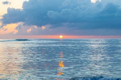 Scenic sunset off the coast of tropical Caribbean island. Sun just above the horizon. royalty free stock photo Scenic sunset off the coast of tropical Caribbean island. Sun just above the horizon. royalty free stock photo