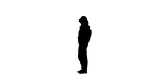 Schattenbild einer Frau, die in die Straße geht Weicher Fokus Wei?er Hintergrund stock footage Schattenbild einer Frau, die in die Straße geht Weicher Fokus Wei?er Hintergrund stock footage