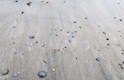 Schließen Sie oben von einem schwarzen Sandstrand stockfotografie Schließen Sie oben von einem schwarzen Sandstrand stockfotografie