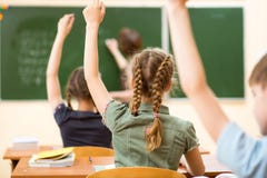 School kids in classroom at lesson Royalty Free Stock Photos School kids in classroom at lesson Royalty Free Stock Photos