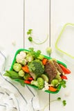 School or picnic lunch box with sandwich and vegetables royalty free stock photos School or picnic lunch box with sandwich and vegetables royalty free stock photos