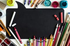 School board with school supplies on white background ready for your design. Back to school concept. Place for text royalty free stock image School board with school supplies on white background ready for your design. Back to school concept. Place for text royalty free stock image