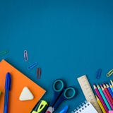 School supplies on blue background stock images School supplies on blue background stock images