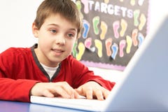 Schoolboy In IT Class Using Computer Royalty Free Stock Photos Schoolboy In IT Class Using Computer Royalty Free Stock Photos