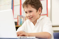 Schoolboy In IT Class Using Computer Stock Image Schoolboy In IT Class Using Computer Stock Image