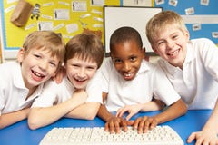 Schoolchildren in IT Class Using Computers Royalty Free Stock Photo Schoolchildren in IT Class Using Computers Royalty Free Stock Photo