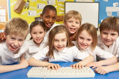 Schoolchildren in IT Class Using Computers Stock Photos Schoolchildren in IT Class Using Computers Stock Photos