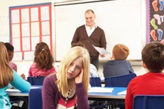 Schoolchildren Studying In Classroom With Teacher stock photography Schoolchildren Studying In Classroom With Teacher stock photography