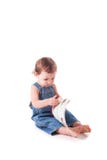 Schönes kleines Baby mit einem Buch stockfotografie Schönes kleines Baby mit einem Buch stockfotografie