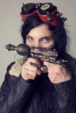 Sci fi dieselpunk eller steampunkflickan med flygaren rullar med ögonen royaltyfri fotografi Sci fi dieselpunk eller steampunkflickan med flygaren rullar med ögonen royaltyfri fotografi