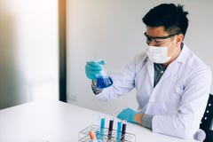 Scientist with equipment and science experiments in laboratory royalty free stock image Scientist with equipment and science experiments in laboratory royalty free stock image