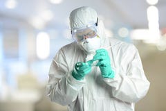 Scientist in protective hazmzt suit working in laboratory royalty free stock photo Scientist in protective hazmzt suit working in laboratory royalty free stock photo