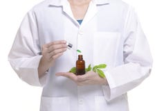 Scientist study and research liquid medicine from natural herbal stock photos Scientist study and research liquid medicine from natural herbal stock photos