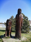 Sculpture of an elderly man and a lion stock photos Sculpture of an elderly man and a lion stock photos