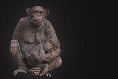 Sculpture. A monkey with a cub. royalty free stock images Sculpture. A monkey with a cub. royalty free stock images