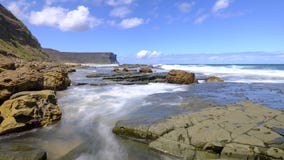 Sea and rocks at Little Garie Head in the Royal National Park, near Sydney, NSW, Australia royalty free stock photography Sea and rocks at Little Garie Head in the Royal National Park, near Sydney, NSW, Australia royalty free stock photography