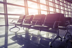 Seats In The Airport Waiting Room At Sunset Royalty Free Stock Photo