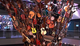 A bunch of instruments especially guitars at the Experience Music Project EMP in Seattle royalty free stock photography A bunch of instruments especially guitars at the Experience Music Project EMP in Seattle royalty free stock photography