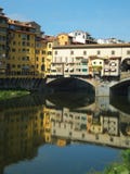 Section of the Ponte Vecchio in Florence, Italy, reflected in the water of the Arno river stock photos Section of the Ponte Vecchio in Florence, Italy, reflected in the water of the Arno river stock photos