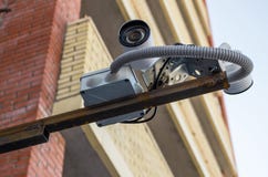 Security camera on building background. stock image Security camera on building background. stock image