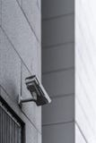Security camera installed outside on a building wall. stock photography Security camera installed outside on a building wall. stock photography