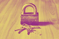 Security concept with lock and keys in duotone toned hipster style stock photography Security concept with lock and keys in duotone toned hipster style stock photography