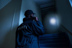 Security Guard With Flashlight royalty free stock images Security Guard With Flashlight royalty free stock images