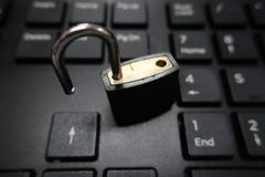 Security opened cadena on a black computer keyboard royalty free stock image Security opened cadena on a black computer keyboard royalty free stock image