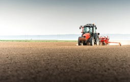 Seeding crops at field Royalty Free Stock Photo Seeding crops at field Royalty Free Stock Photo