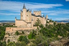 Segovia, Spain. The Famous Alcazar Of Segovia, Rising Out On A R Stock Images Segovia, Spain. The Famous Alcazar Of Segovia, Rising Out On A R Stock Images