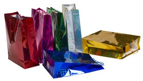 Sei sacchetti della spesa di carta Colourful sparsi Fotografia Stock Libera da Diritti Sei sacchetti della spesa di carta Colourful sparsi Fotografia Stock Libera da Diritti