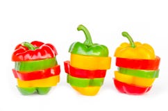 A selection of colorful bell peppers sliced in pieces to make on Stock Photos A selection of colorful bell peppers sliced in pieces to make on Stock Photos