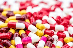 Selective focus on colorful of antibiotic capsules pills stock images Selective focus on colorful of antibiotic capsules pills stock images