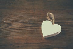 Selective Focus Photo Of Wooden Heart On Rustic Table. Valentine S Day Celebration Concept. Stock Photography Selective Focus Photo Of Wooden Heart On Rustic Table. Valentine S Day Celebration Concept. Stock Photography