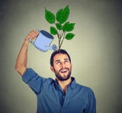 Self investment. man with many ideas Stock Image Self investment. man with many ideas Stock Image