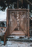 A self-made old wooden door on the street stock photo A self-made old wooden door on the street stock photo