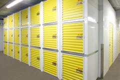 self-storage-units-perspective-view-rows-small-closed-yellow-doors-40548597.jpg